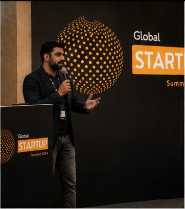 Speaker presenting at the Summit podium